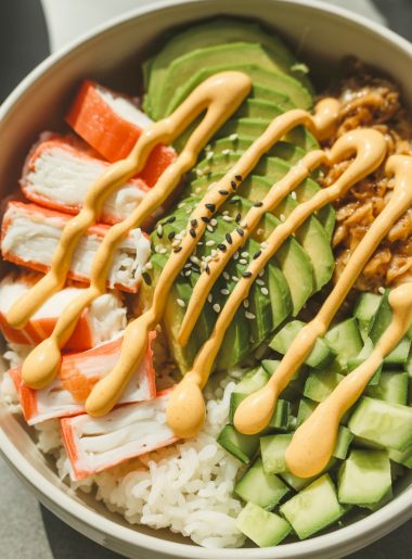 California roll sushi bowls with crab, avocado, and cucumber over rice